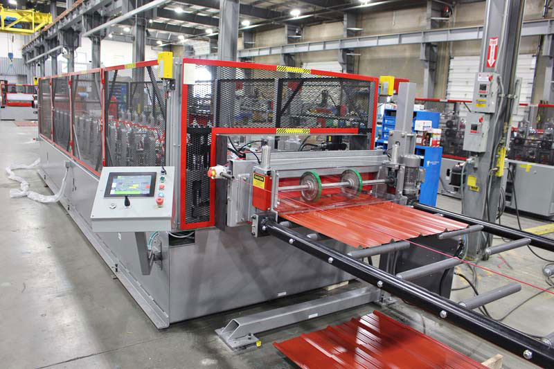 Roll forming machine creating panels.