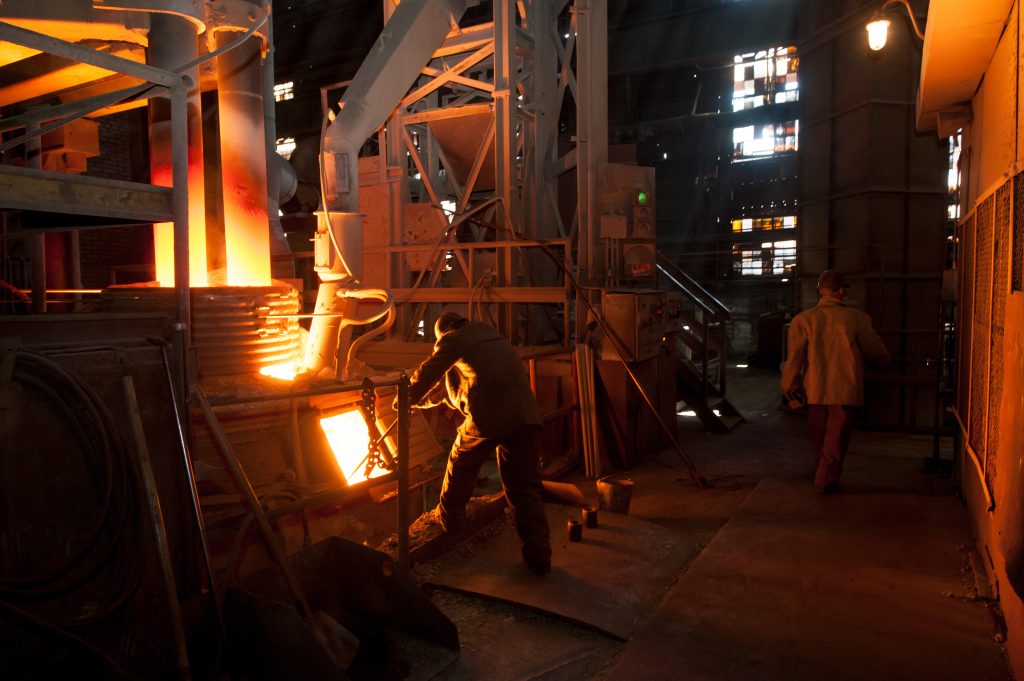 Steelworker near a arc furnace