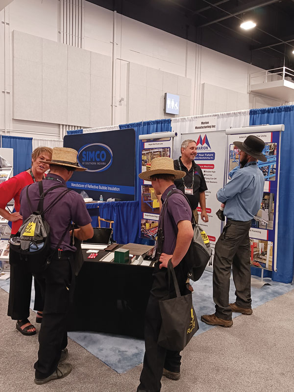 Amy and Tim Richmond from Marion Manufacturing address questions at the 2025 Construction Rollforming Show in Dayton, Ohio.