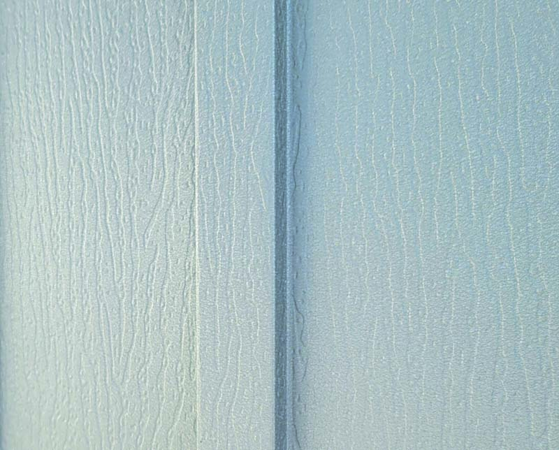Wood-grain texture that’s embossed into Board & Batten panels.
Photo courtesy of Hixwood
