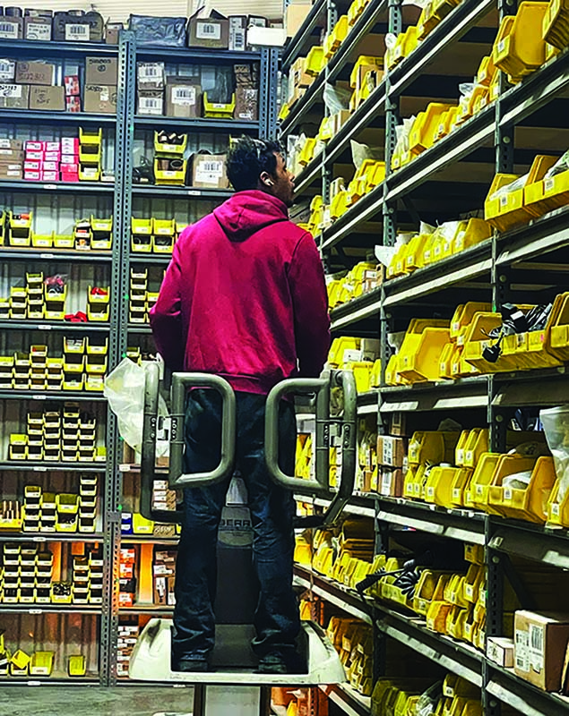 Picking parts from inventory. Photo courtesy of The Bradbury Group