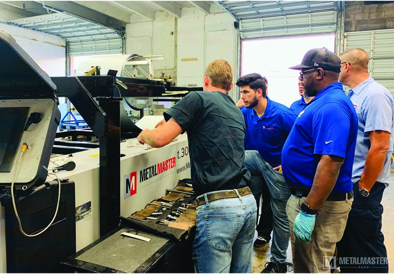 Customers receive training from New Tech technicians.
Photo courtesy of New Tech Machinery.